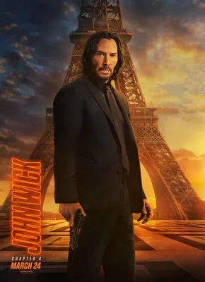 A movie poster of John Wick: Chapter 4: The image features the lead character John Wick, played by Keanu Reeves, standing in the rain, looking determined. He is wearing a suit and carrying a gun in his hand. The background is dark and murky, with a city skyline visible in the far distance. The title 'John Wick' is placed at the top of the poster in bold white letters, with 'Chapter 4' written beneath it in smaller font. The release date is written in the bottom left corner of the poster, and the production credits are placed in the bottom right